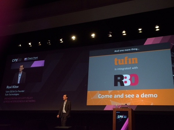 Ruvi Kitov announcing that Tufin Orchestration Suite will integrate with Check Point's new R80